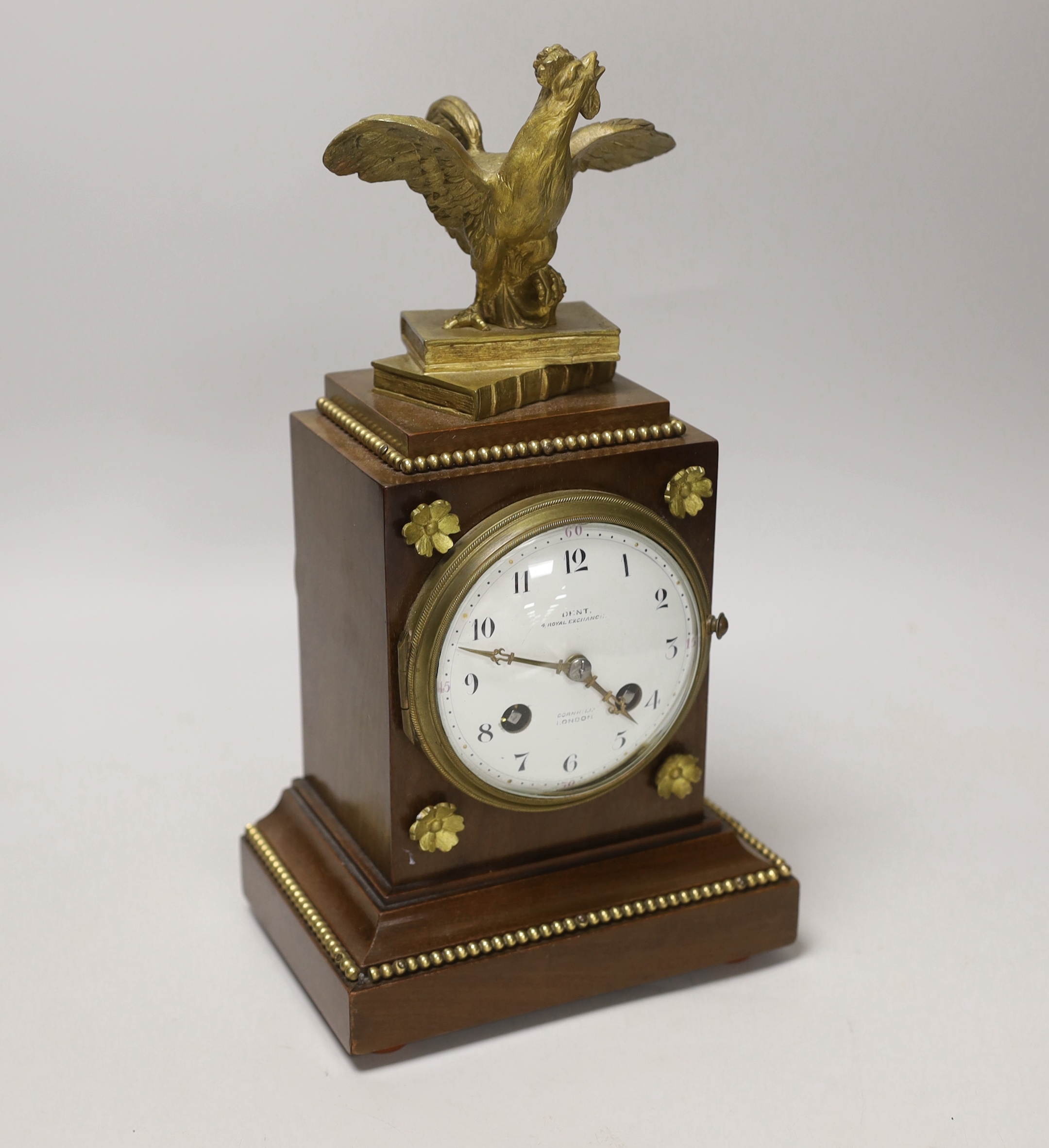 A French mahogany and ormolu mounted mantel clock, retailed by Dent, London, surmounted with a gilt metal cockerel, 30cm high